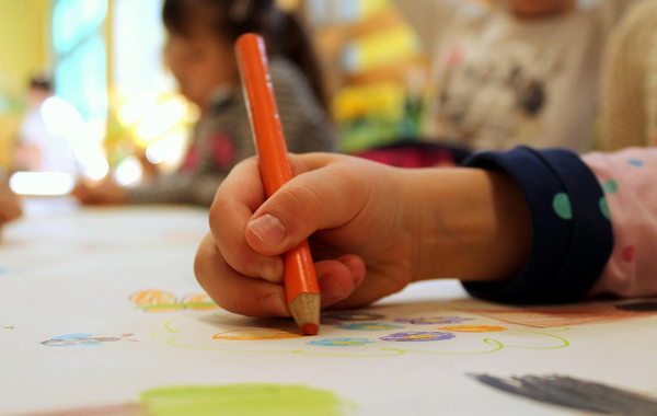 Hand mit Stift