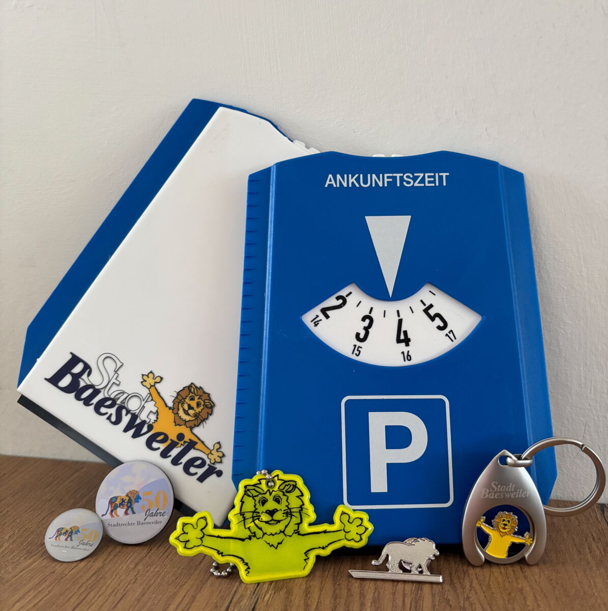 Parkscheibe, Löwen-Anstecker, Reflektor, Einkaufswagenchip